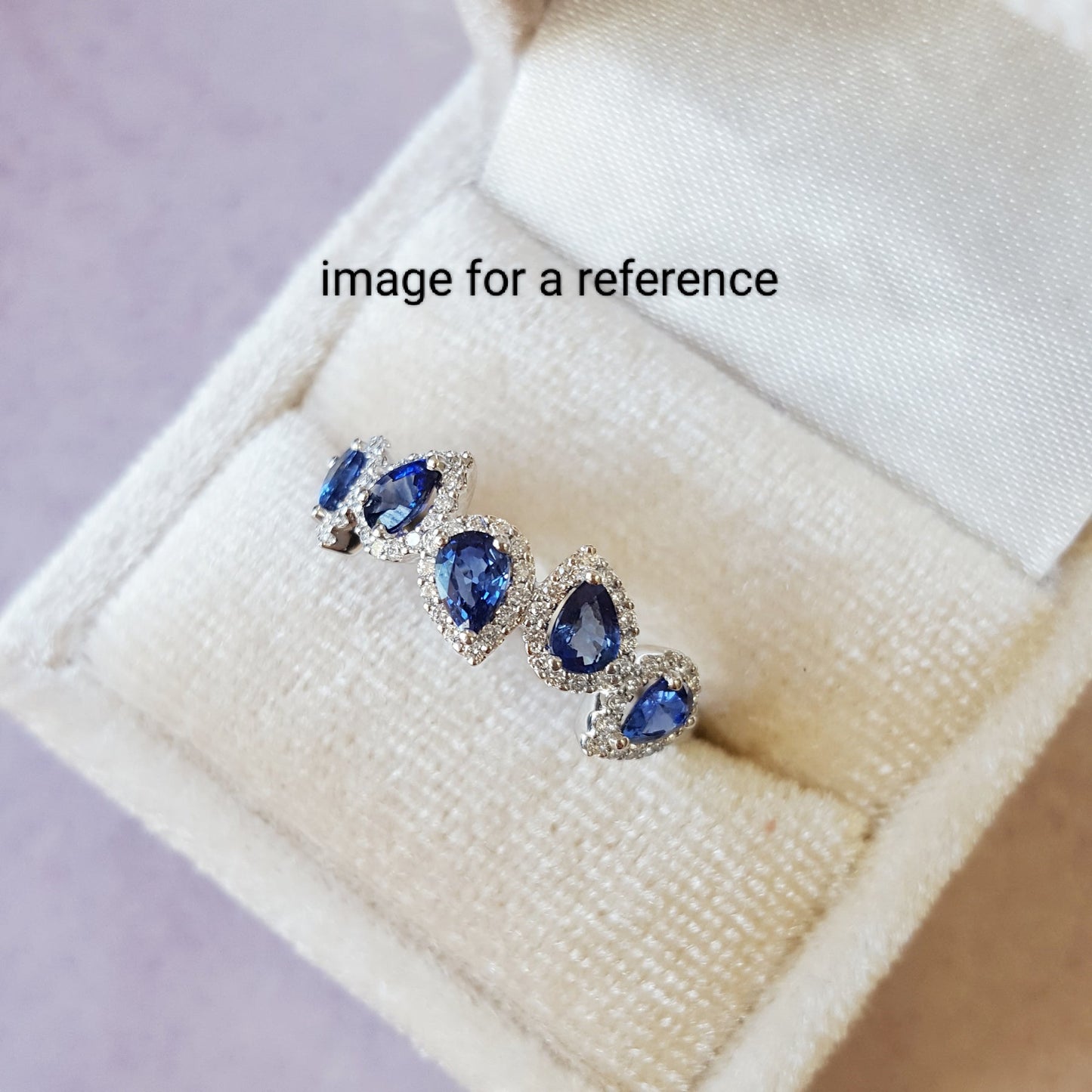 Custom Made Jewelry - 1ct Blue Stones Ring with Halo Moissanites
